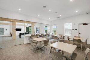 RISE Citrus Ridge elevated design townhomes in Davenport, Florida: Lobby Cafeteria-style Seating and Bar