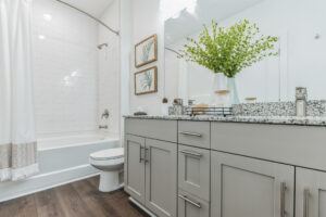 RISE Citrus Ridge elevated design townhomes in Davenport, Florida: Interior Furnished Bathroom with Bath