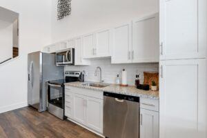 RISE Citrus Ridge elevated design townhomes in Davenport, Florida: Interior In-unit Kitchen with Modern Appliances