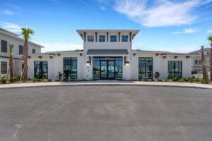 RISE Citrus Ridge elevated design townhomes in Davenport, Florida: Lobby Exterior from Parking Lot
