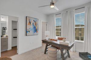 RISE Citrus Ridge elevated design townhomes in Davenport, Florida: Interior In-unit Dining Room with Kitchen in Background